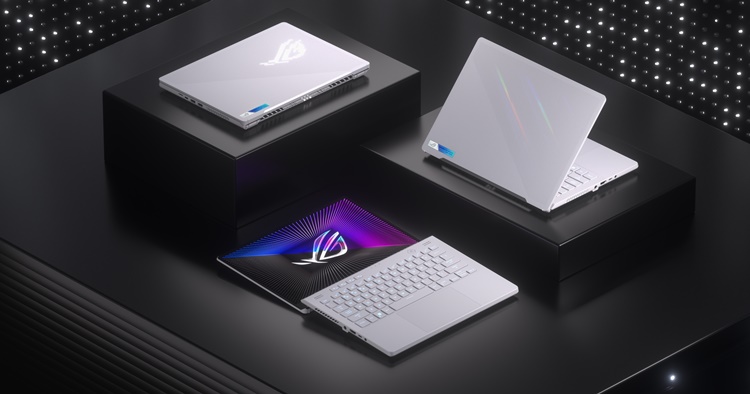 Three Moonlight White ROG Zephyrus G14’s, arranged on three pillars of differing heights, with the lid closed, half opened, and fully opened. .jpg