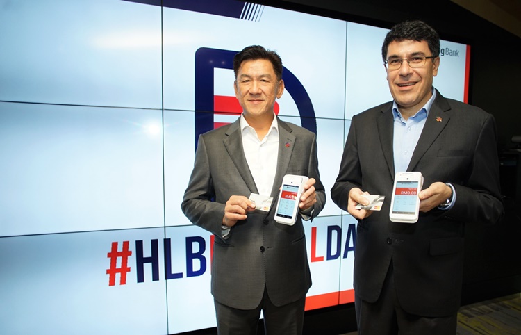 2From left to right_ Charles Sik, Managing Director of Personal Financial Services and Domenic Fuda, Group Managing Director and Chief Executive Officer of Hong Leong Bank Berhad.JPG